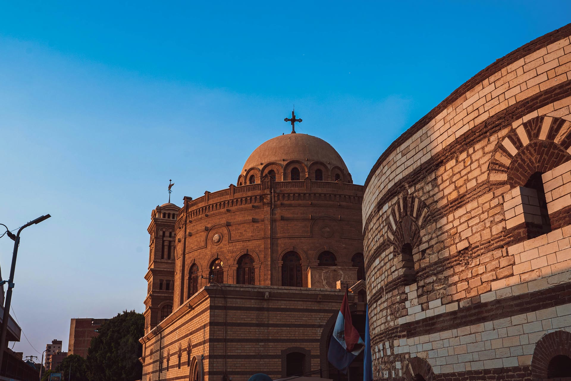 A domed church and an adjoining brick rotunda in Cairo